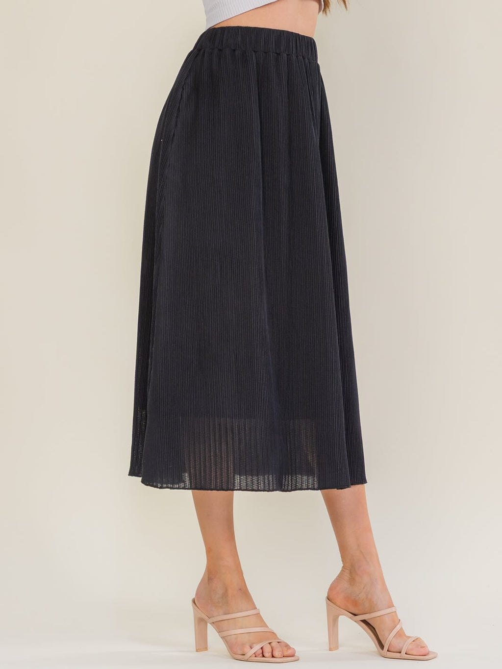 Black pleated midi skirt front