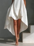 Maria | Sleeveless Round Neck Asymmetric Hem Midi Dress