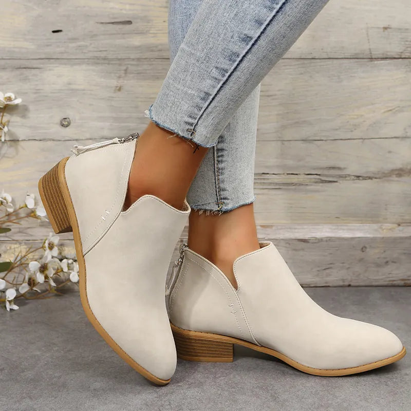 Beige pointed-toe ankle boots with block heel