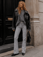 Grey plaid trousers on model