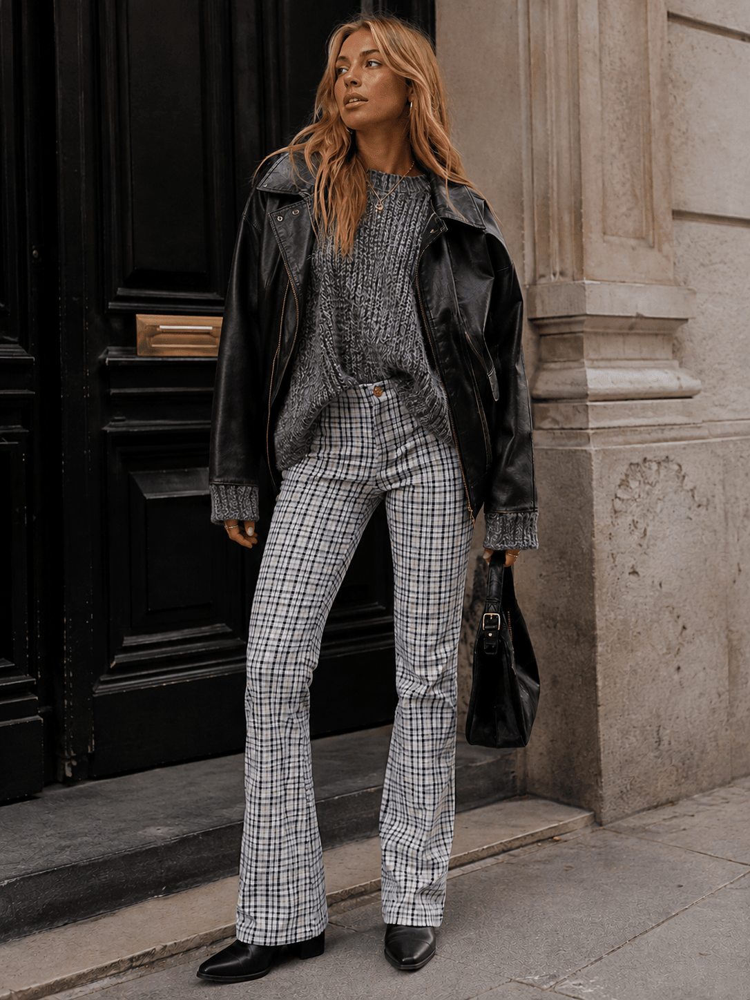 Grey plaid trousers on model